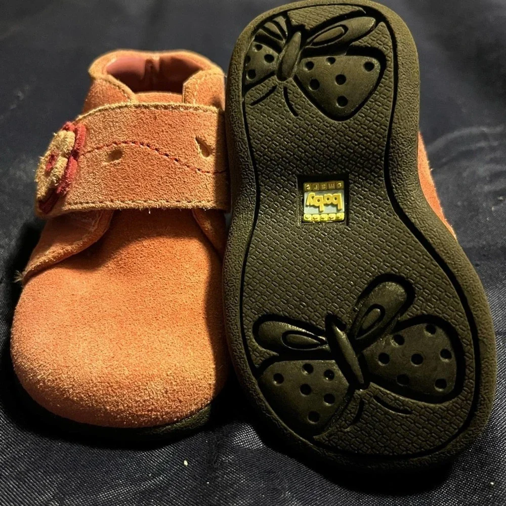 Adorable pink suede baby shoes